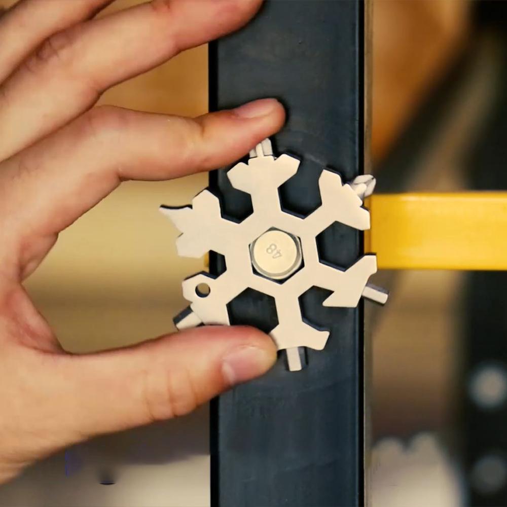 "18-i-1 snöflingformat multiverktyg i rostfritt stål, kompakt design för DIY och hemmet, mångsidigt och stilfullt."