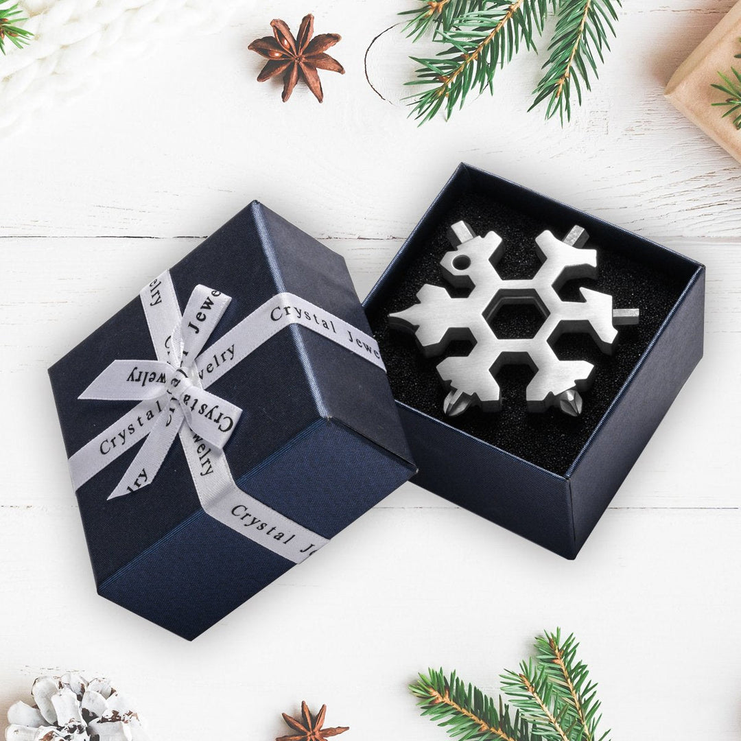 "18-i-1 snöflingformat multiverktyg i rostfritt stål, kompakt design för DIY och hemmet, mångsidigt och stilfullt."