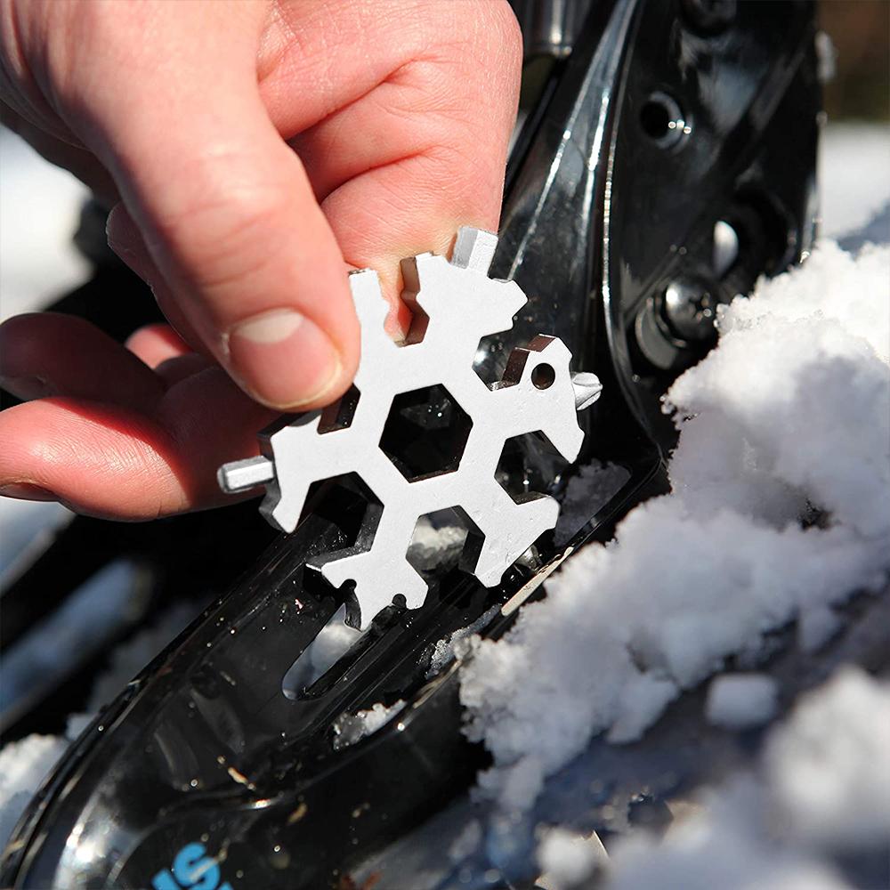 "18-i-1 snöflingformat multiverktyg i rostfritt stål, kompakt design för DIY och hemmet, mångsidigt och stilfullt."