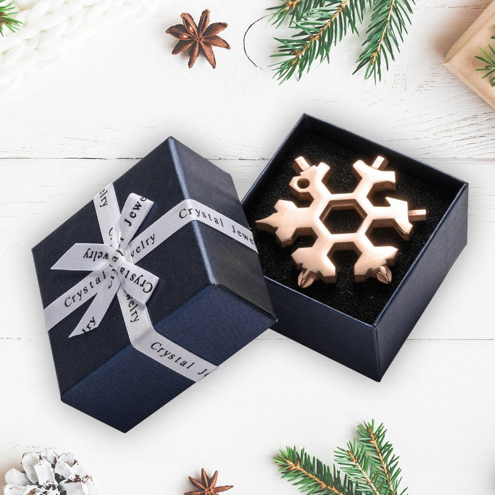 "18-i-1 snöflingformat multiverktyg i rostfritt stål, kompakt design för DIY och hemmet, mångsidigt och stilfullt."