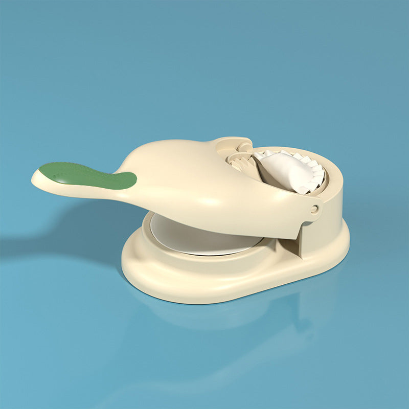 "2-i-1 dumplingsmaskin manuell tortilla press, beige plast, ergonomiskt handtag för enkel dumplings- och tortillasformning."