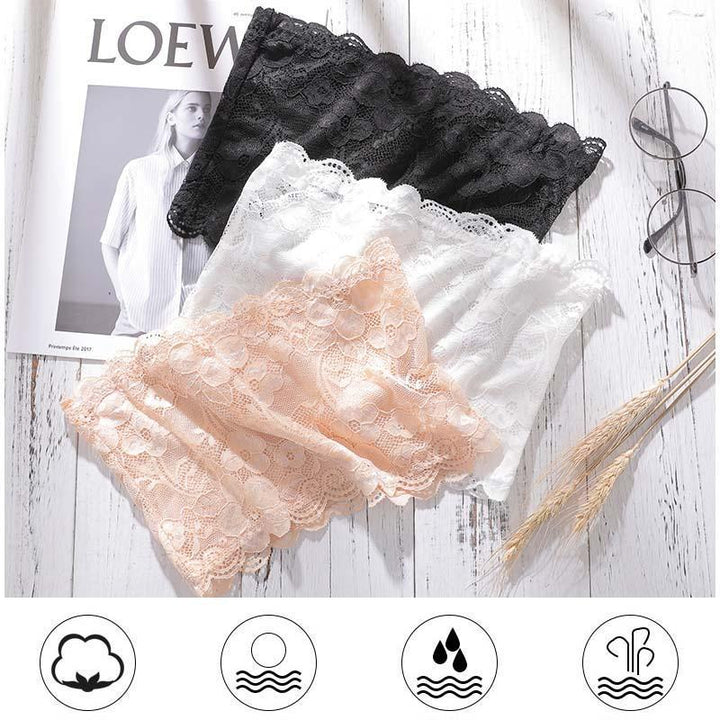 "Axelbandslös dam bandeau BH i spets och spandex, vit färg, elegant spetsmönster, perfekt för sommargarderoben."