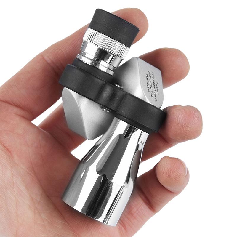 "Bärbart fickteleskop med BAK4 prisma, svart och kompakt design, perfekt för natur- och stjärnskådning utomhus."