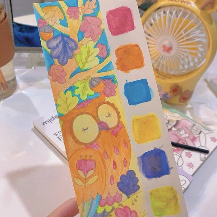 "Barn fickakvarell målningsbok med färgglada illustrationer, säker för små händer, främjar kreativitet och lärande."