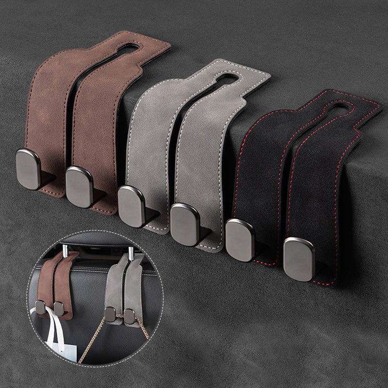 "Bilstolsrygg i läder med krok och telefonhållare, elegant design, praktisk förvaring, passar bilens framsida och baksida."