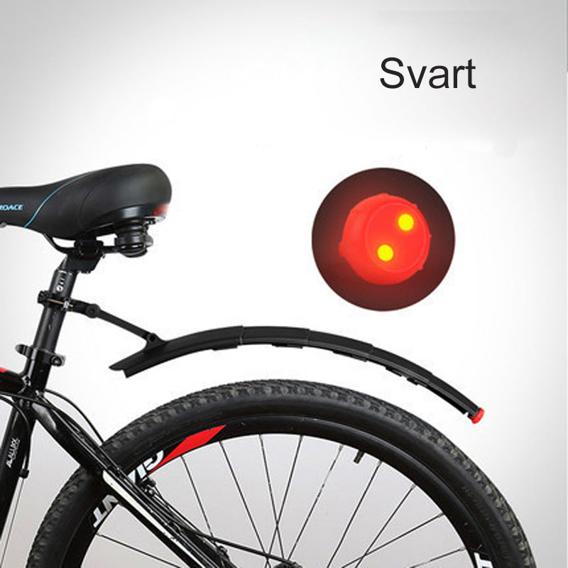 "Cykel stänkskydd, justerbart och vattentätt, med inbyggt bakljus, i svart plast för optimal säkerhet och synlighet."