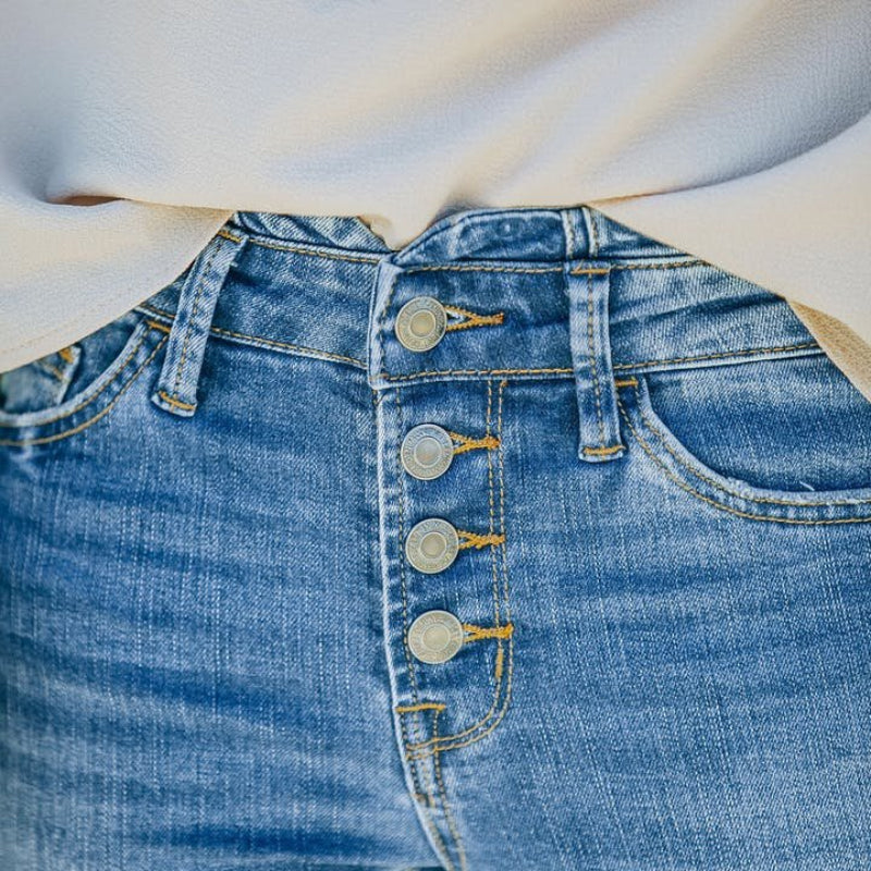 "Dam högmidjade 70-tals flare jeans, vintage stil, blå denim med smickrande passform och böjda midjesömmar."
