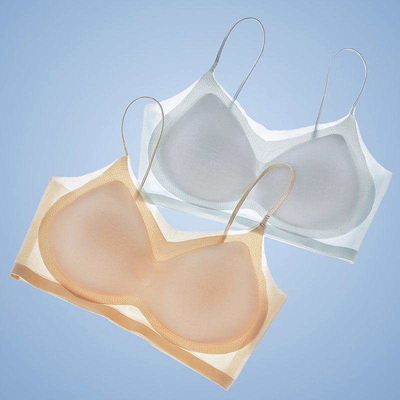 "Dam sömlös komfort-BH i plusstorlek med ice silk, töjbar trådlös design, vit färg, visar nära visning av materialet."