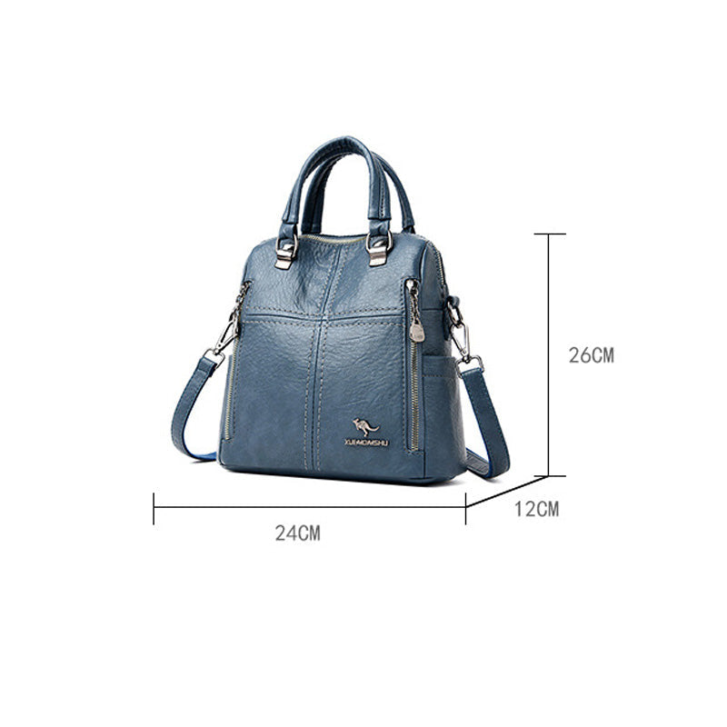 "Damer PU-läder multifunktionell ryggsäck i röd, elegant och slitstark design för vardag och resor, stor kapacitet."