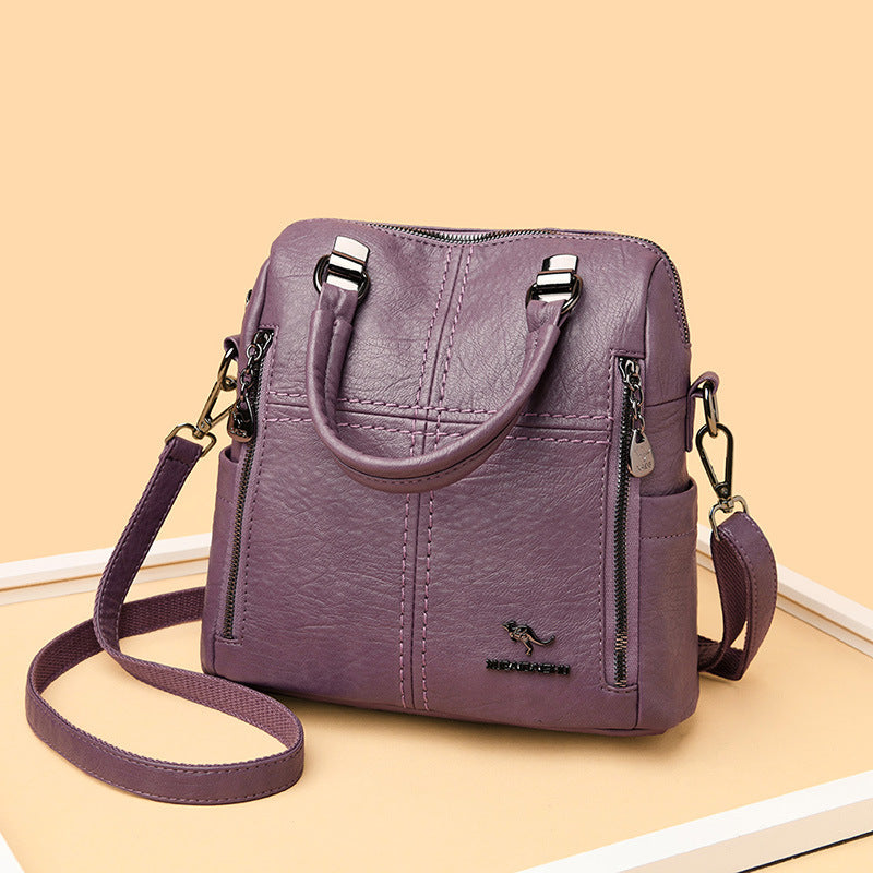 "Damer PU-läder multifunktionell ryggsäck i röd, elegant och slitstark design för vardag och resor, stor kapacitet."