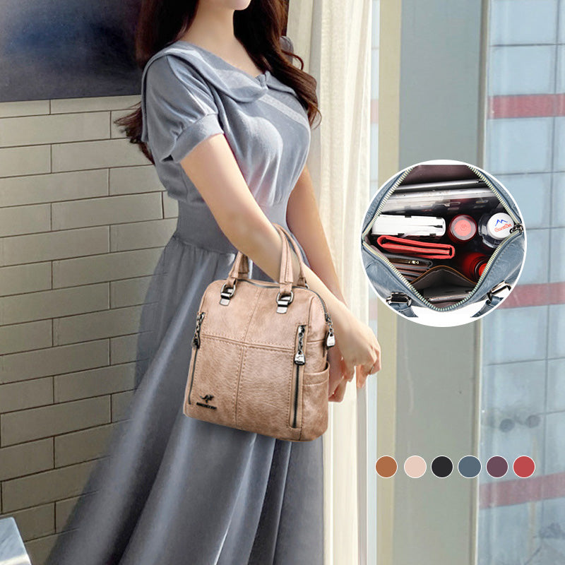 "Damer PU-läder multifunktionell ryggsäck i röd, elegant och slitstark design för vardag och resor, stor kapacitet."