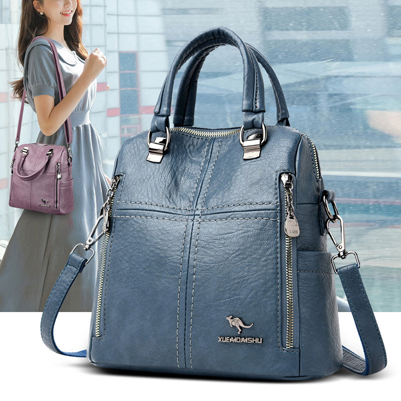 "Damer PU-läder multifunktionell ryggsäck i röd, elegant och slitstark design för vardag och resor, stor kapacitet."