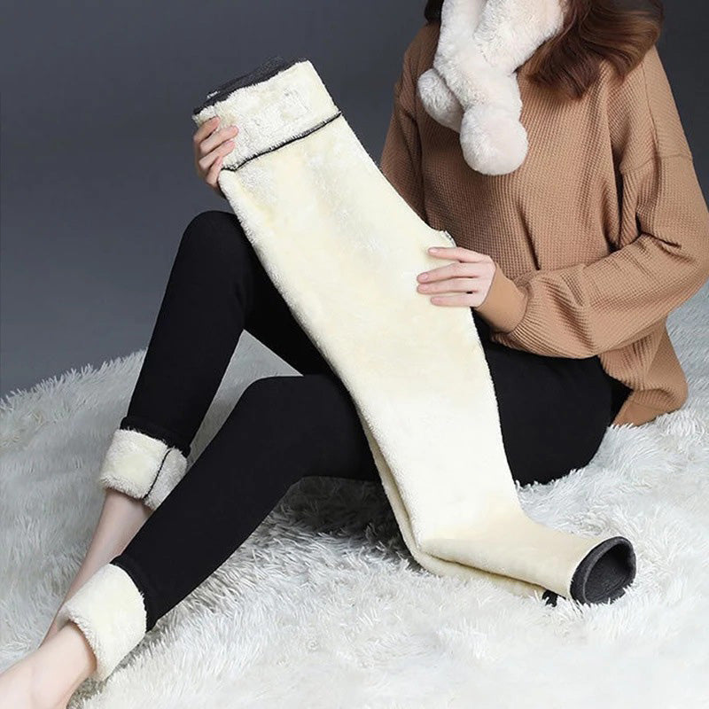 "Damer vinter leggings med plysch foder i svart, hög midja, varm och bekväm design för kallt väder, flexibelt material."
