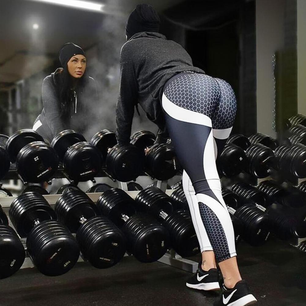 "Damhögmidja yogabyxor med geometriskt mönster, stretchigt tyg, smickrande passform och trendigt utseende."