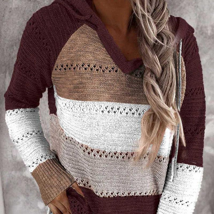 "Damhoodie med V-ringning och färgblock, stickad design. Passar för streetwear, elegant och bekväm för kyligt väder."