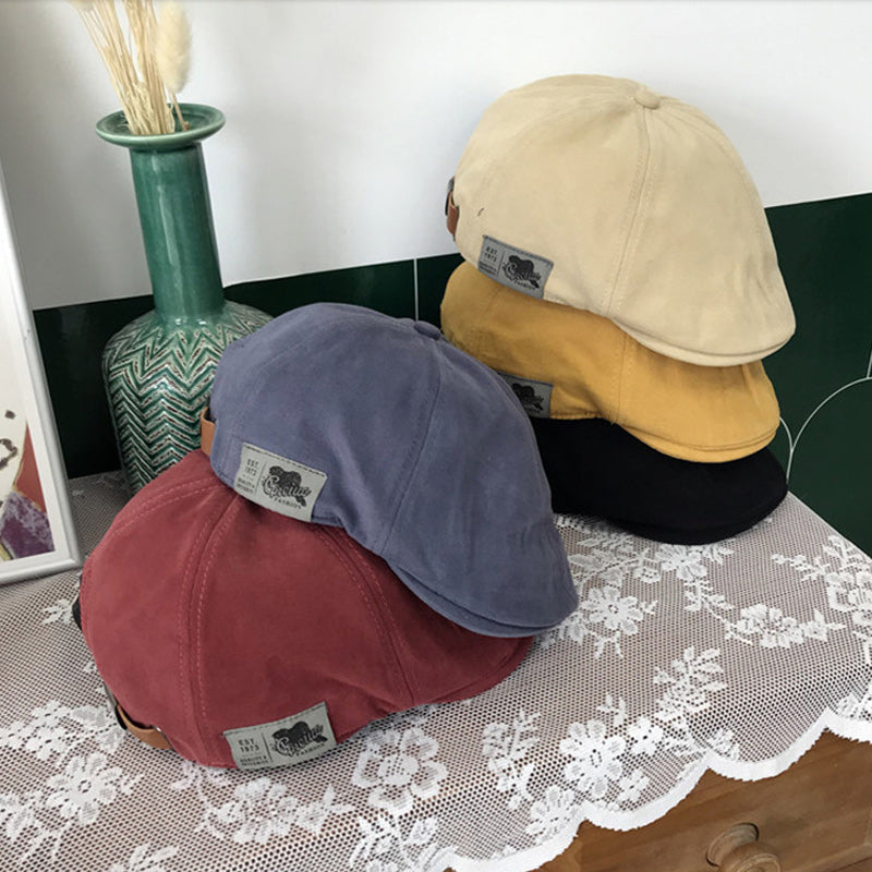 "Dams retro baskermössa i bomull med kupolform, kort brätte, i grått. Vindtät och solskyddande."