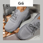 grå
