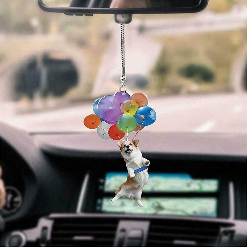 Dekorativ hundbilhänge i glimmerplast, hänger från bilspegeln, ljus och livfull design, ger bil en personlig touch.