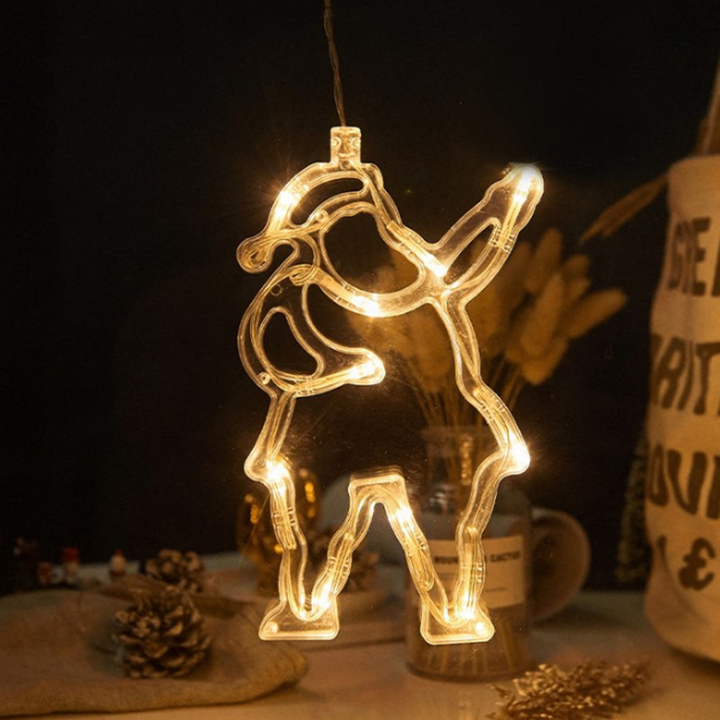 "Dekorativa LED-lampor med sugkopp, julmotiv: tomte, snöflinga, varmvit ljus för inbjudande julstämning i hemmet."
