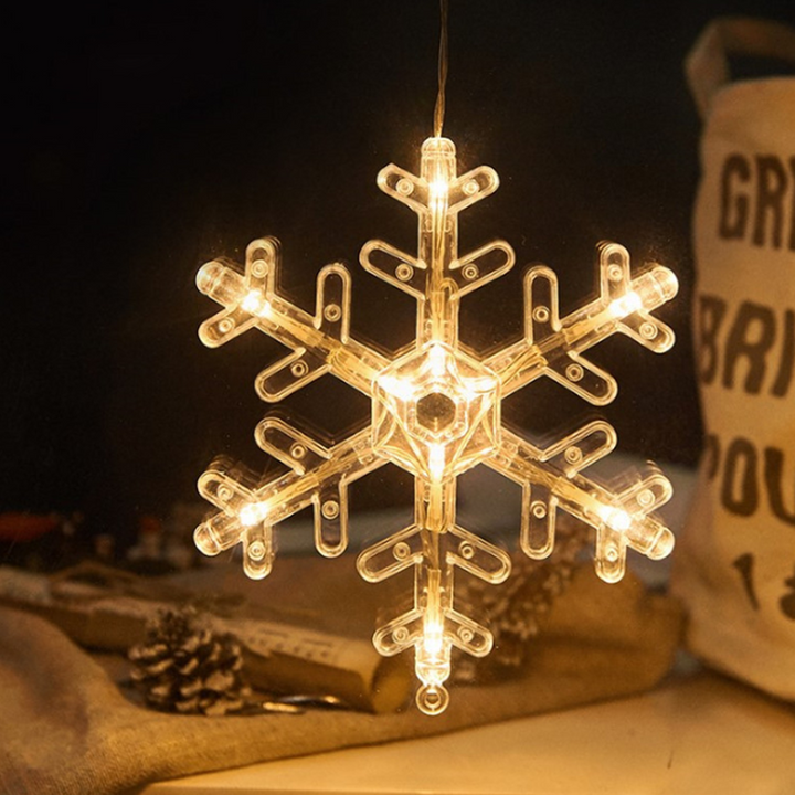 "Dekorativa LED-lampor med sugkopp, julmotiv: tomte, snöflinga, varmvit ljus för inbjudande julstämning i hemmet."