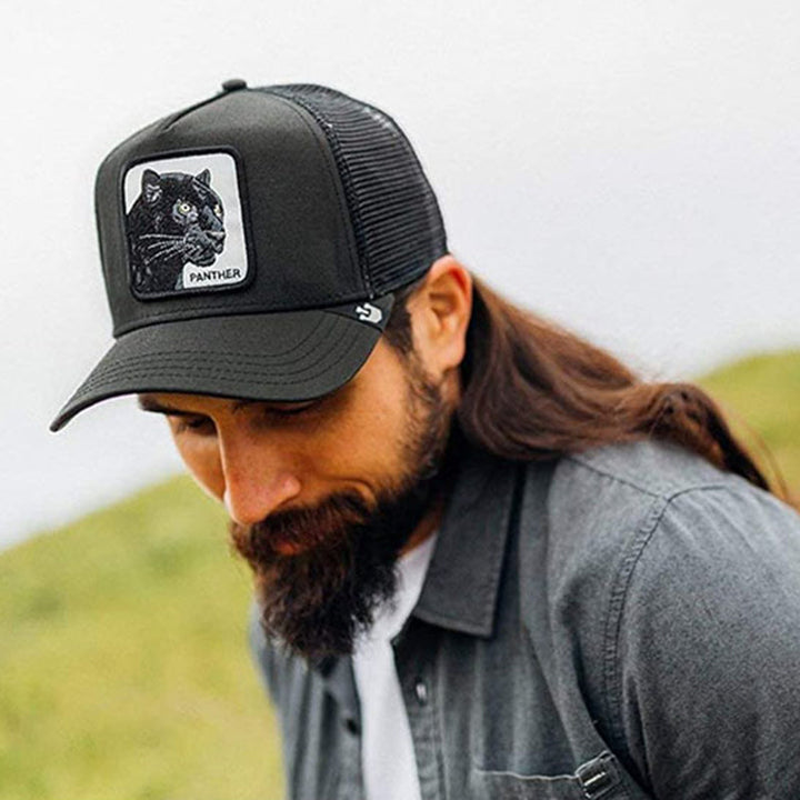 "Djurmönster nät basebollkeps, justerbar, andningsbar för män. Elegant djurmotiv, perfekt för utomhusaktiviteter."