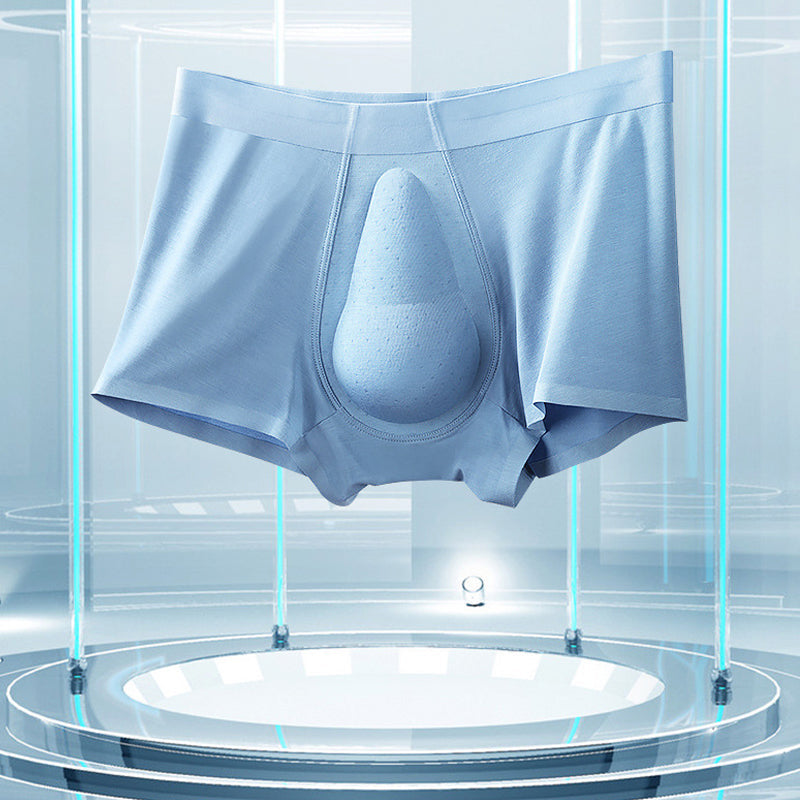 "Ekologiska bomullsboxershorts för män i svart, grå och blå, med stödpaneler för komfort och modern stil."