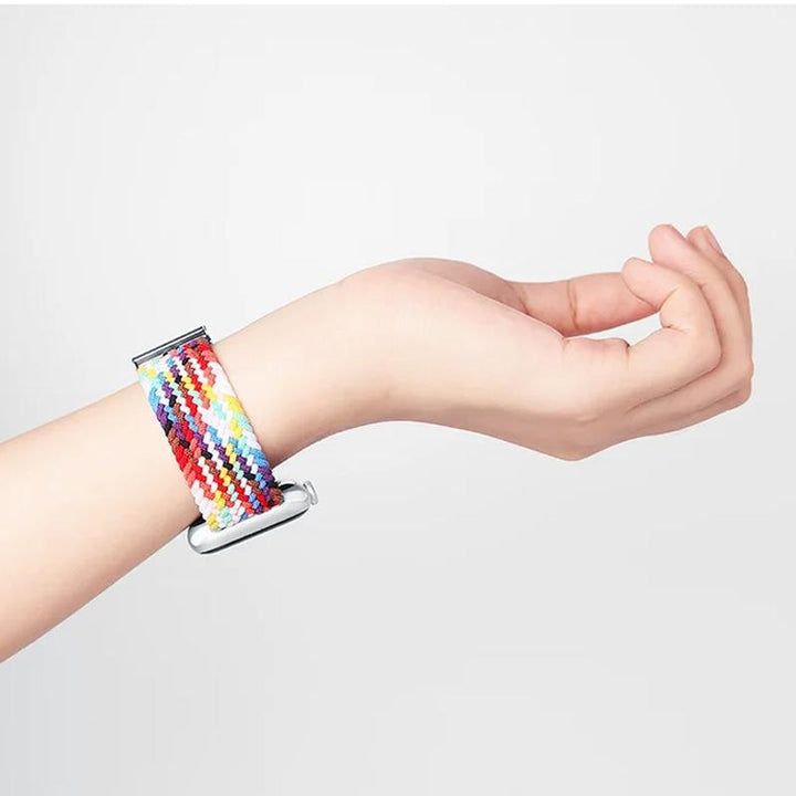 "Elastiskt flätat nylonband för klocka, flera färger, elegant och bekvämt, perfekt damtillbehör."