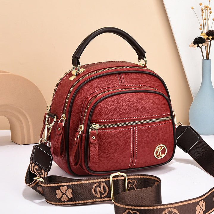 "Elegant dam crossbody-väska i mjukt PU-läder, justerbar rem, rymlig design för modern användning, perfekt för alla tillfälle