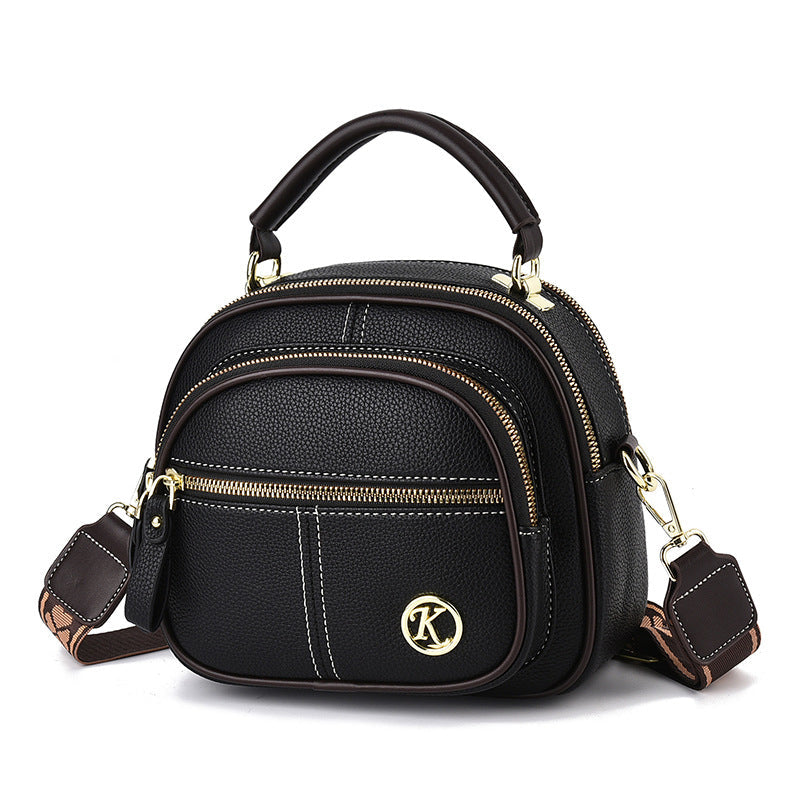 "Elegant dam crossbody-väska i mjukt PU-läder, justerbar rem, rymlig design för modern användning, perfekt för alla tillfälle
