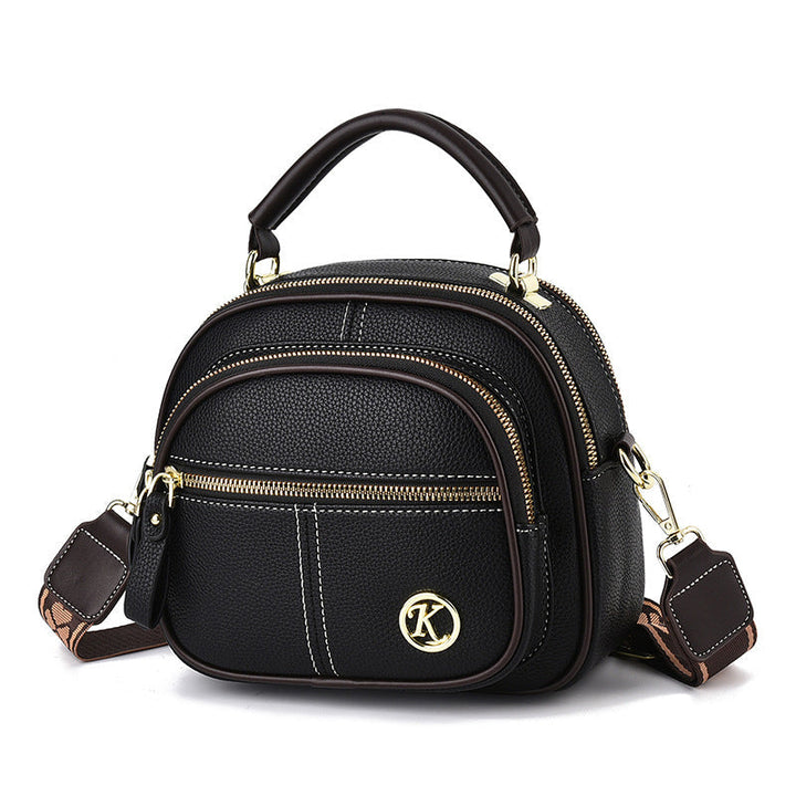 "Elegant dam crossbody-väska i mjukt PU-läder, justerbar rem, rymlig design för modern användning, perfekt för alla tillfälle