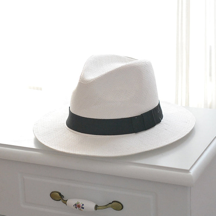 "Elegant dam solhatt med stort brätte, naturlig halm, beige/white, erbjuder utmärkt solskydd, sommaraccessoar."