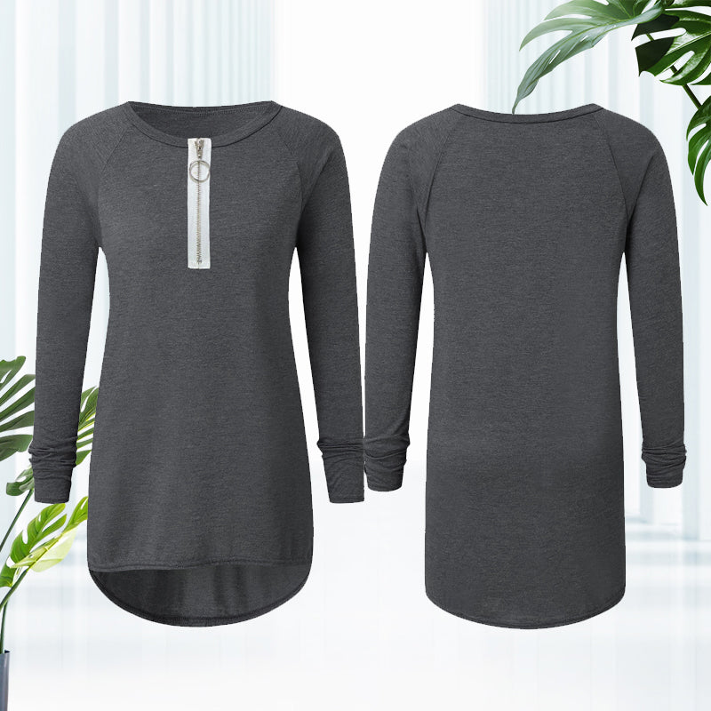 Elegant damtopp med rund hals och subtil dragkedja, finns i flera färger. Idealisk för både vardag och fest.