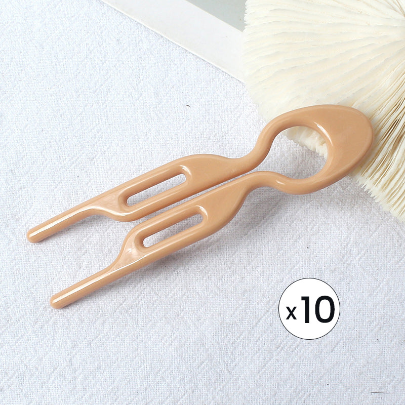 "Elegant fransk hårnål i mångfärgad design för stilfull hårstyling; perfekt damaccessoar för alla tillfällen."