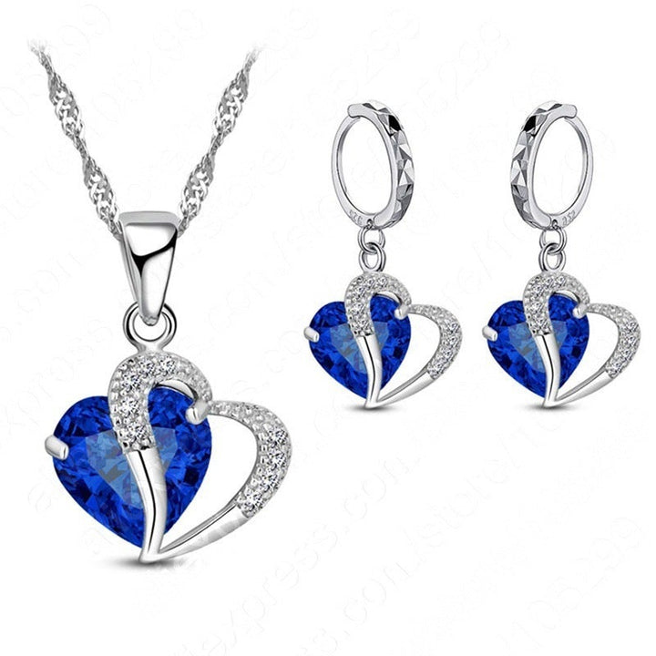 "Elegant hjärtformade zirkonsmycken set för kvinnor med halsband och örhängen i strålande kubiska zirkoner."