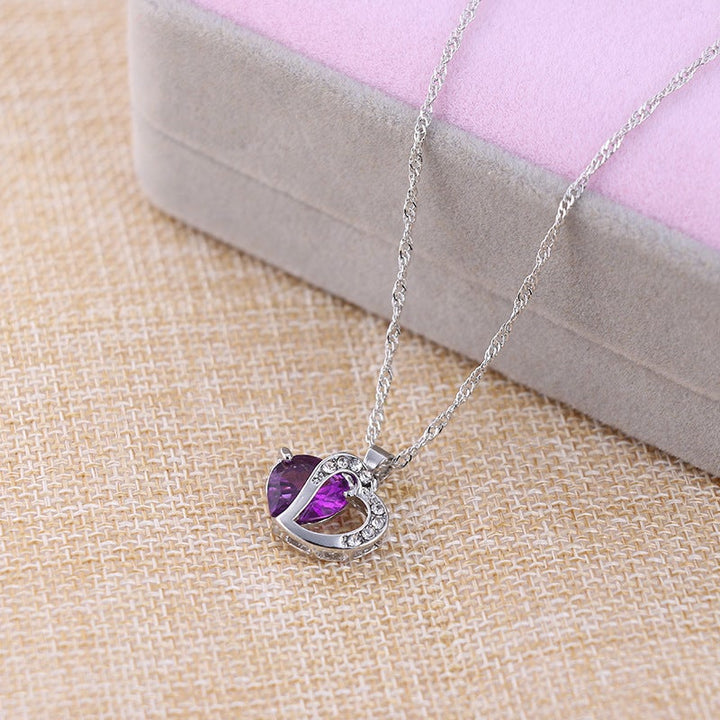 "Elegant hjärtformade zirkonsmycken set för kvinnor med halsband och örhängen i strålande kubiska zirkoner."
