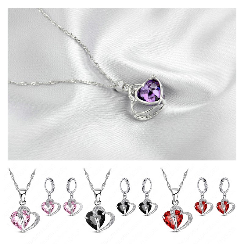 "Elegant hjärtformade zirkonsmycken set för kvinnor med halsband och örhängen i strålande kubiska zirkoner."