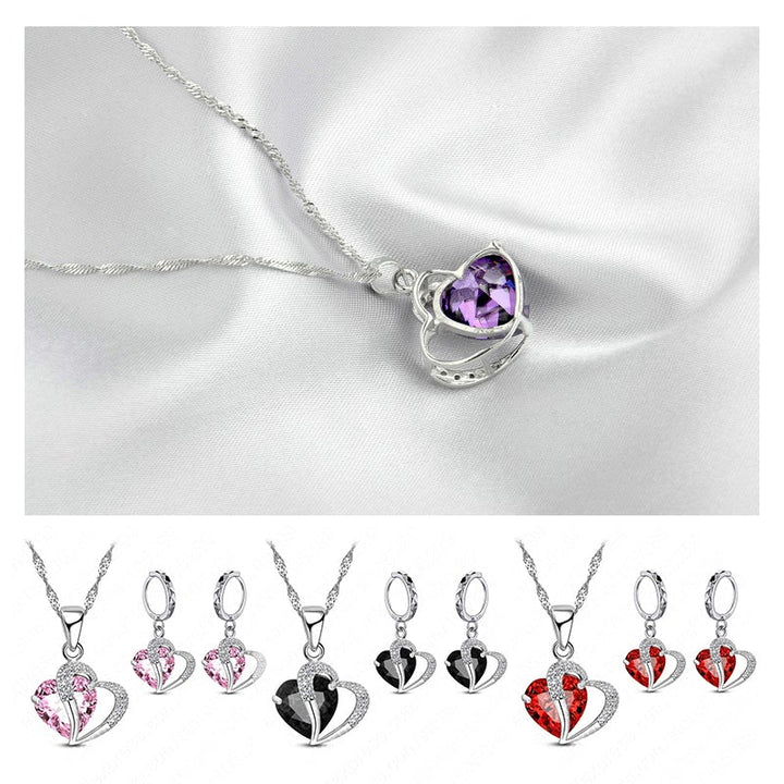 "Elegant hjärtformade zirkonsmycken set för kvinnor med halsband och örhängen i strålande kubiska zirkoner."