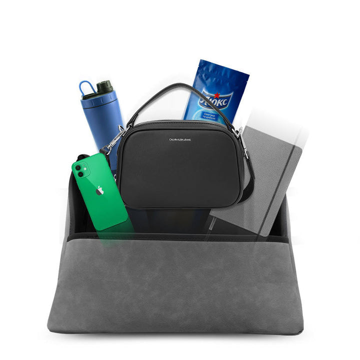 "Elegant läderbilförvaringsficka för säker körning, optimal för handväska och föremål, passar de flesta bilar."