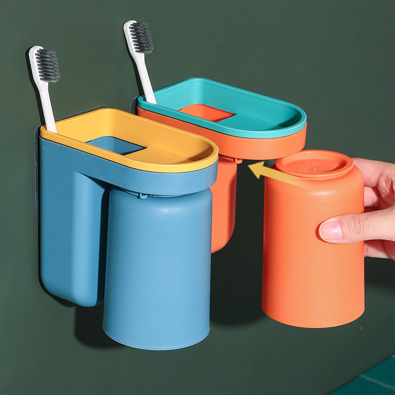 "Elegant tandborsthållare i färger blå, grön, gul, orange, med platsbesparande design och universell passform för badrum."