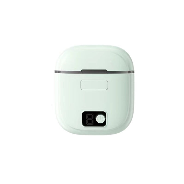 "Elektrisk smart nagelklippare med automatisk trim, 360° roterande blad och integrerad förvaringsbehållare, grön färg."