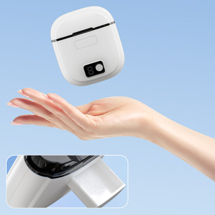 "Elektrisk smart nagelklippare med automatisk trim, 360° roterande blad och integrerad förvaringsbehållare, grön färg."