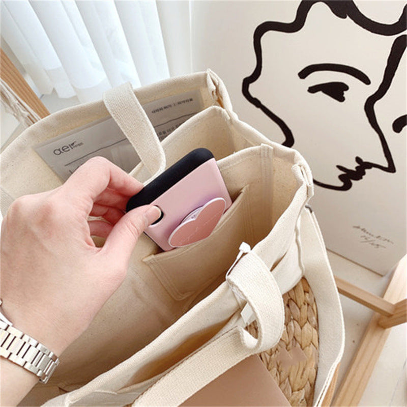 "Enfärgad dam tygkasse i robust canvas, med breda handtag och stor kapacitet. Perfekt som chic och hållbar väska."