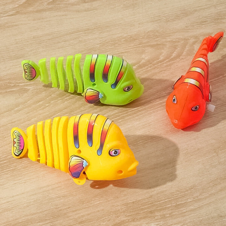 Färgglad fiskleksak för barn med livlig design, 360° rotation och säker plast. Perfekt för kreativ och rolig lek.