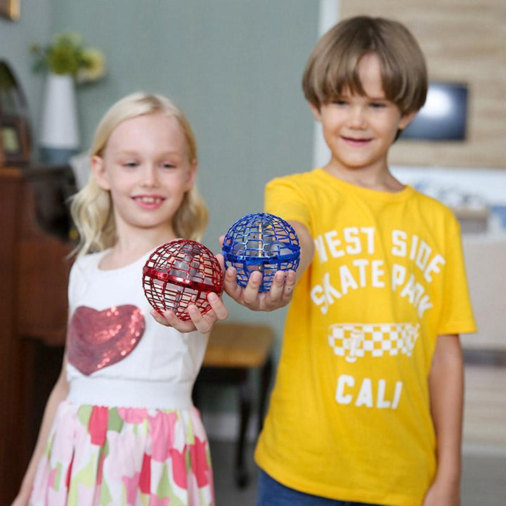 "Färgglad Flygande Spinner Mini Drone för barn, rund och aerodynamisk design, svävar i luften, säker och lätt leksak."