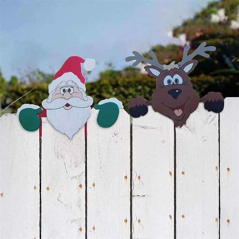 "Färgglad julstaketdekoration med älgar och snögubbar för utomhusbruk, ger trädgården festlig julstämning."