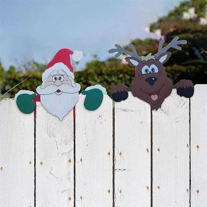 "Färgglad julstaketdekoration med älgar och snögubbar för utomhusbruk, ger trädgården festlig julstämning."