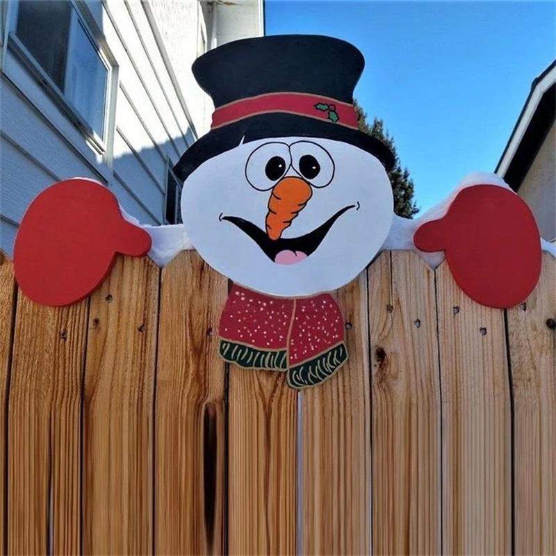 "Färgglad julstaketdekoration med älgar och snögubbar för utomhusbruk, ger trädgården festlig julstämning."