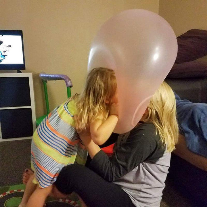 "Färgglad uppblåsbar Bubble Ball för barn, perfekt för utomhuslek. Tillverkad av hållbart material, finns i rosa, grön och bl