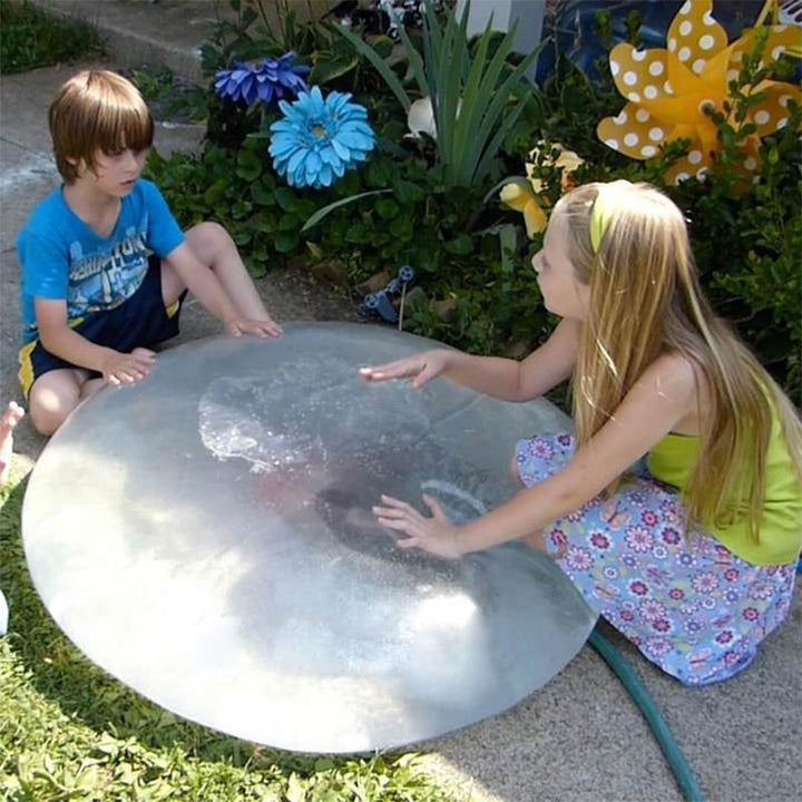 "Färgglad uppblåsbar Bubble Ball för barn, perfekt för utomhuslek. Tillverkad av hållbart material, finns i rosa, grön och bl