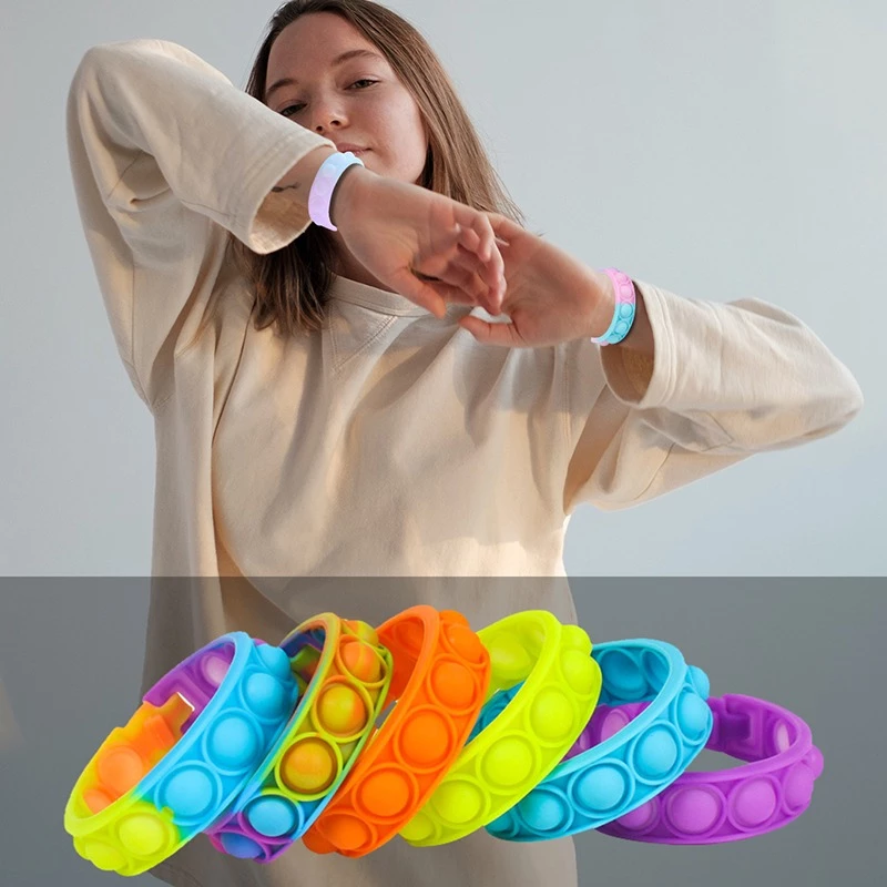"Färggrannt unisex pop bubble armband, sensorisk leksak, med poppbara bubblor för stressavlastning och avkoppling."